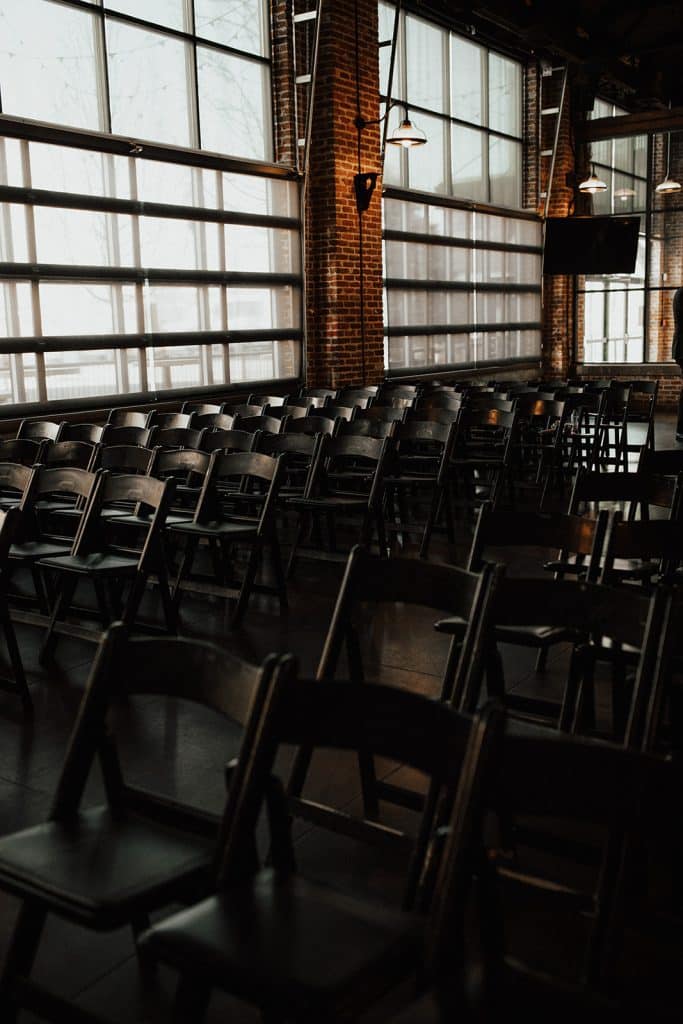 Ceremony empty seats B K mile high station denver colorado wedding portrait photographer 252 websize 683x1024